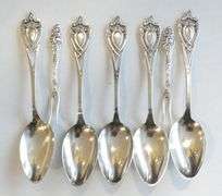 STERLING SPOONS AND COCKTAIL FORKS