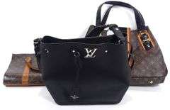 THREE LEATHER PURSES