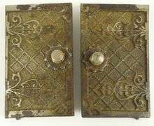 DOUBLE-DOOR CAST IRON COIN BANK