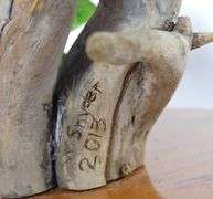 TWO W. SNYDER CARVINGS