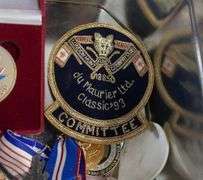 TIN OF ASSORTED CURIOS