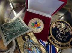 TIN OF ASSORTED CURIOS