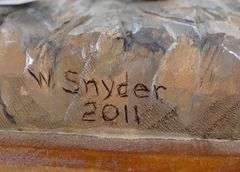 TWO W. SNYDER CARVINGS