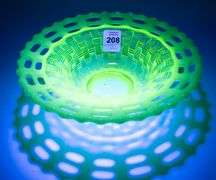 TWO PIECES OF VASELINE GLASS