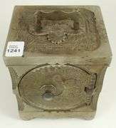 J. E. STEVENS COIN BANK