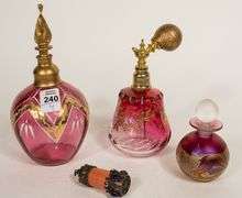 THREE SCENT BOTTLES AND ATOMIZER