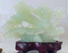 CHINESE GREEN JADE AND PINK QUARTZ CARVINGS