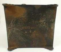 ANTIQUE CAST IRON COIN BANK