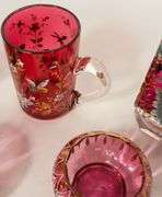 FIVE PIECES OF CRANBERRY GLASS