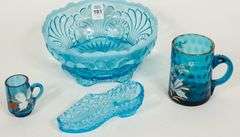 FOUR PIECES OF BLUE GLASS