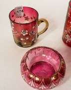 FIVE PIECES OF CRANBERRY GLASS