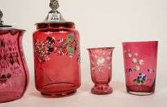FIVE PIECES OF CRANBERRY GLASS
