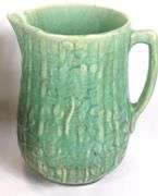 FOUR ANTIQUE STONEWARE PITCHERS