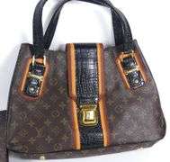 THREE LEATHER PURSES