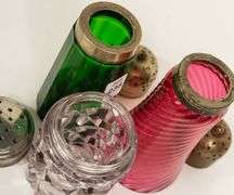 THREE SUGAR CASTERS AND CREAMER