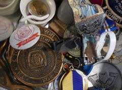 TIN OF ASSORTED CURIOS