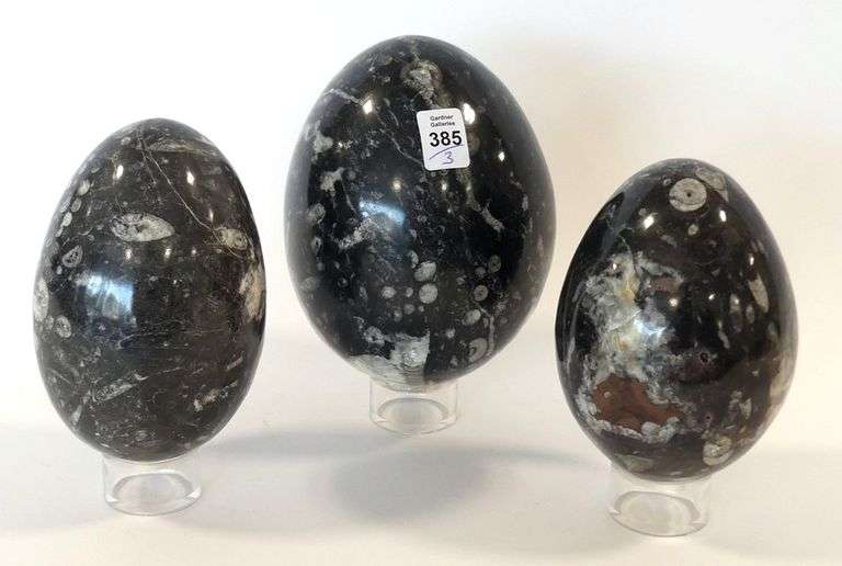 THREE LARGE STONE EGGS