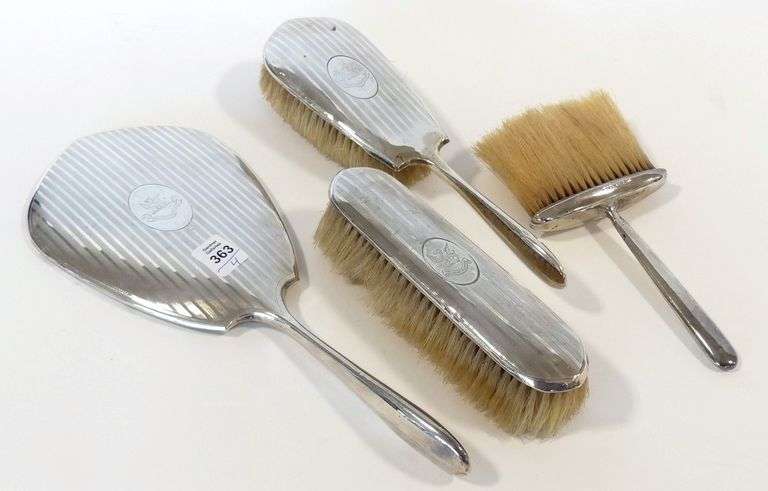FOUR-PIECE STERLING TOILETTE SET