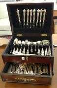 TWO SETS OF SILVER PLATE FLATWARE IN CANTEEN