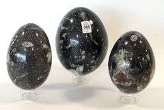 THREE LARGE STONE EGGS