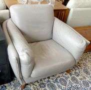 NATUZZI GREY LEATHER ARMCHAIR