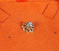 GOLD TIE TAC
