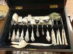 TWO SETS OF SILVER PLATE FLATWARE IN CANTEEN