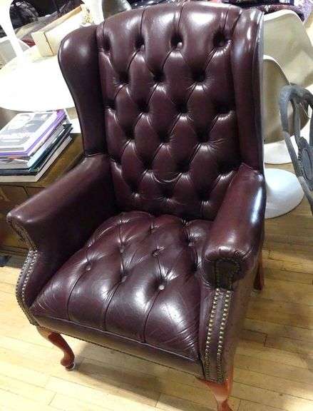 LEATHER WING-BACK ARMCHAIR