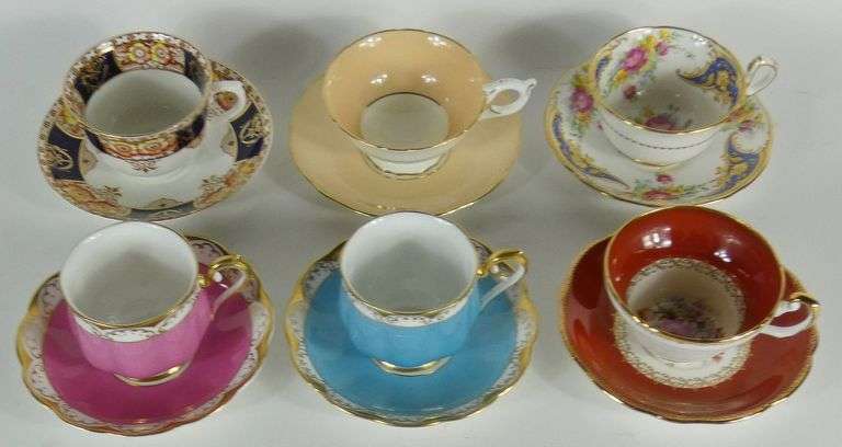 12 CUPS & SAUCERS