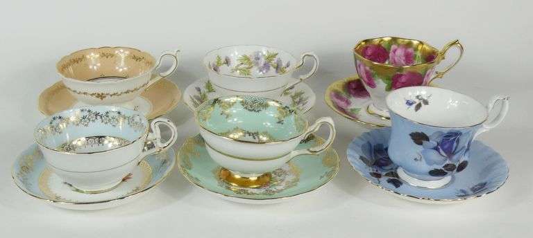12 CUPS & SAUCERS