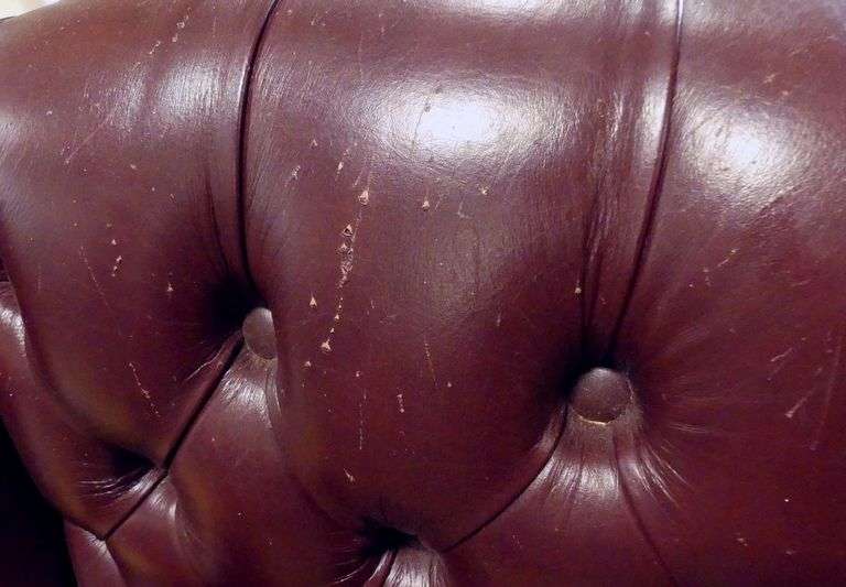 LEATHER WING-BACK ARMCHAIR