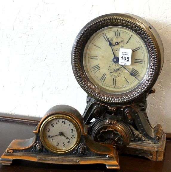 TWO METAL CLOCKS