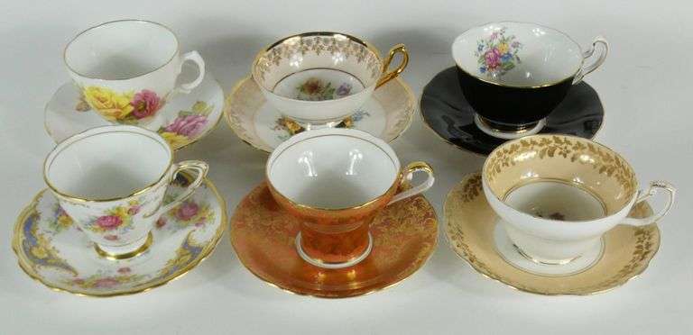 12 CUPS & SAUCERS