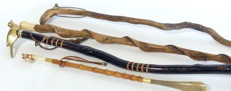 FIVE WALKING STICKS AND RIDING CROP