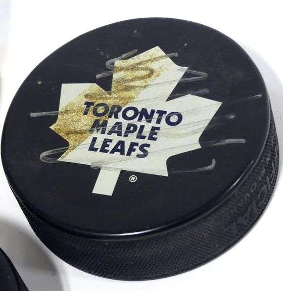THREE AUTOGRAPHED HOCKEY PUCKS