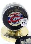 THREE AUTOGRAPHED HOCKEY PUCKS
