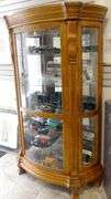 ILLUMINATED BOW-FRONT DISPLAY CABINET
