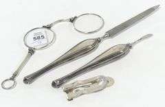 FOUR STERLING SILVER CURIOS