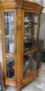 ILLUMINATED BOW-FRONT DISPLAY CABINET