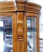 ILLUMINATED BOW-FRONT DISPLAY CABINET