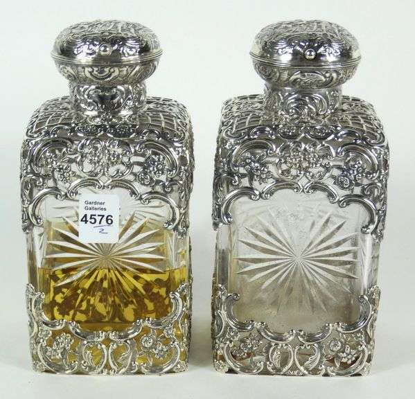 PAIR SILVER OVERLAY DECANTERS