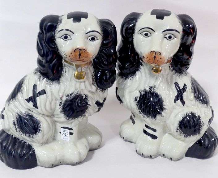 PAIR OF POTTERY "DOG" FIGURINES
