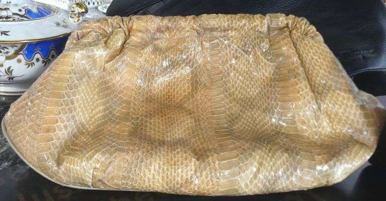 FOUR DESIGNER PURSES