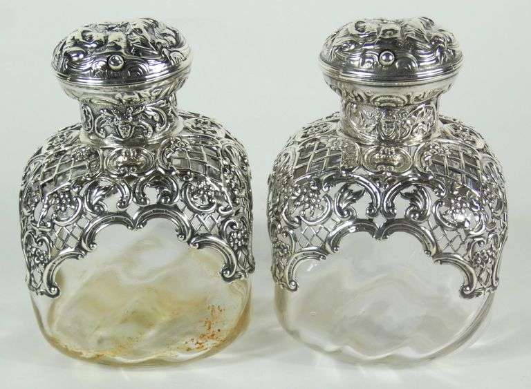 PAIR SILVER OVERLAY BOTTLES