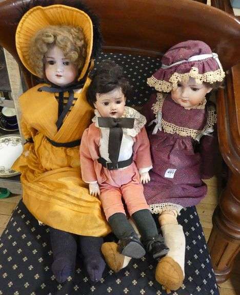 THREE ANTIQUE GERMAN BISQUE HEAD DOLLS