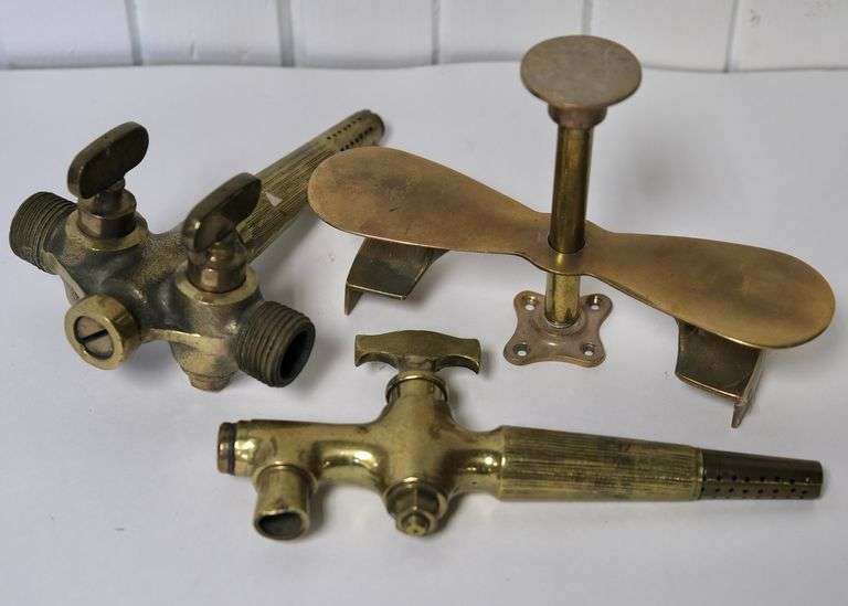 BRASS SPIGOTS AND BUTTER PRESS