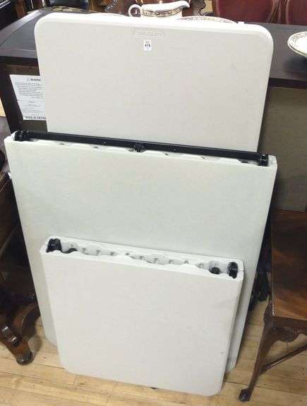 THREE FOLDING TABLES