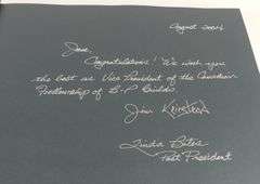 TWO AUTOGRAPHED BOOKS