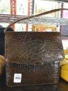 FOUR DESIGNER PURSES