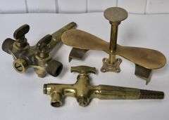 BRASS SPIGOTS AND BUTTER PRESS